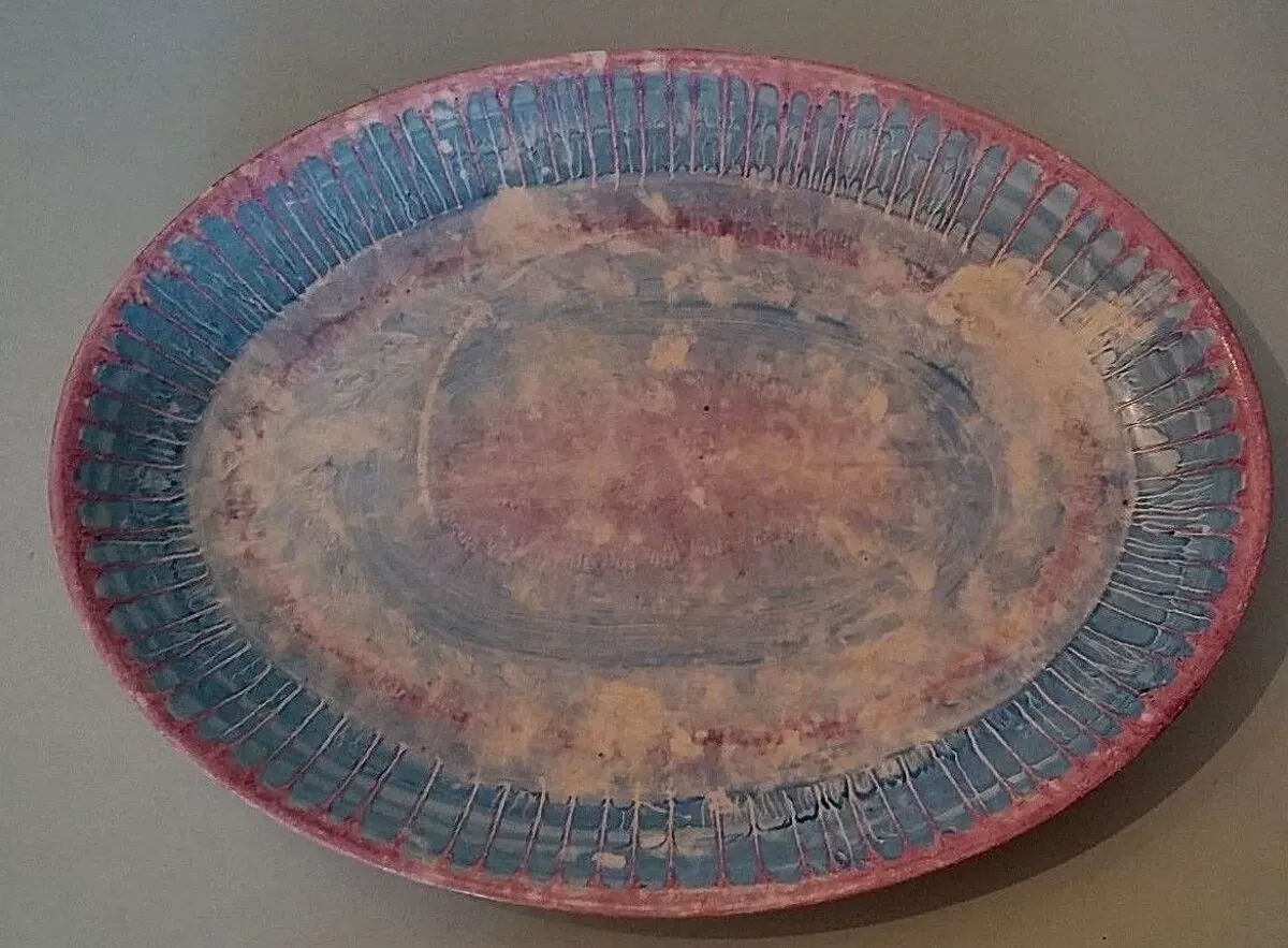 Illustration numéro 4 du produit Plat ovale vintage faïence Industria Argentina Haretord signé