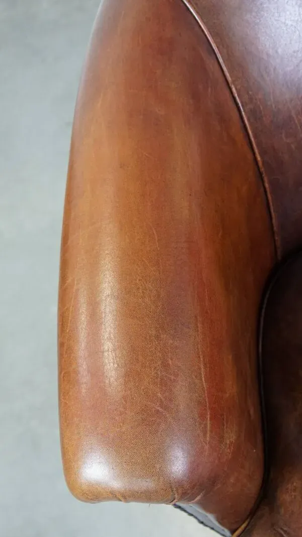 Illustration numéro 4 du produit Fauteuil club en cuir de mouton couleur cognac