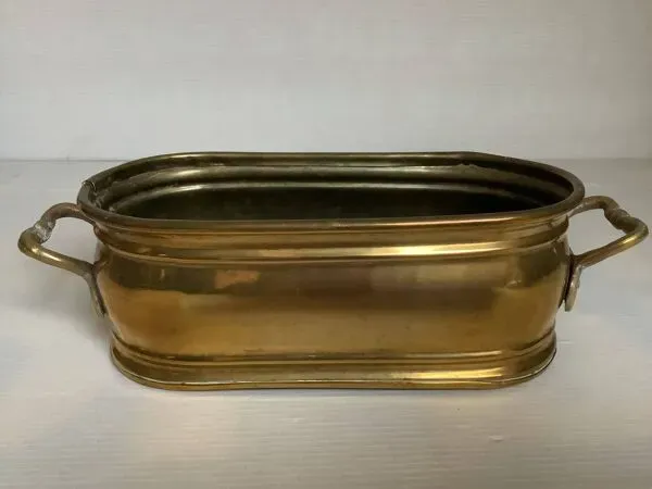 Illustration numéro 4 du produit Jardinière vide poche en laiton