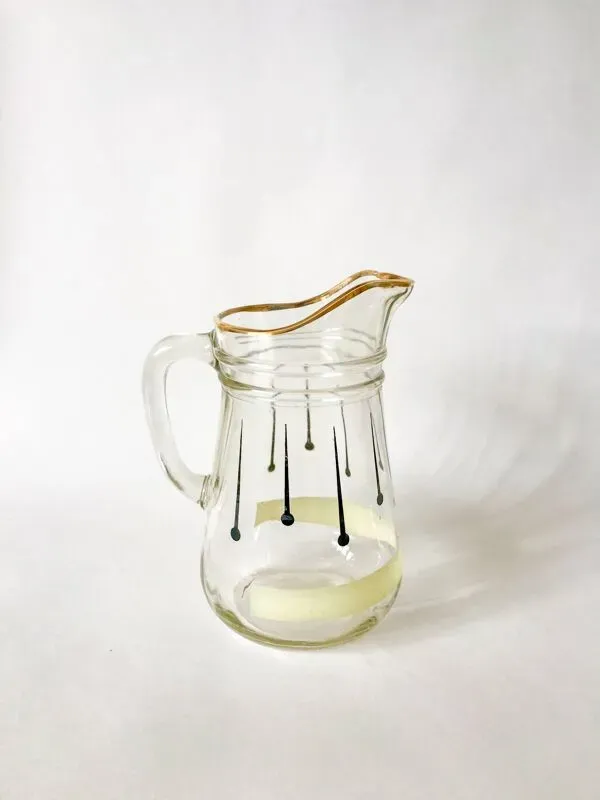 Illustration numéro 4 du produit pichet en verre à motifs psyché noirs liseré doré années 60-70