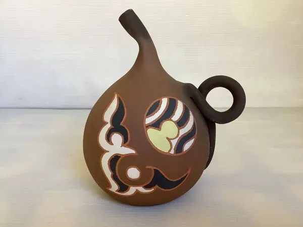 Illustration numéro 4 du produit Vase terracotta signé