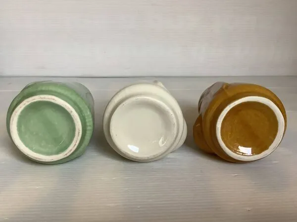 Illustration numéro 4 du produit Trio de petits vases têtes style moaï