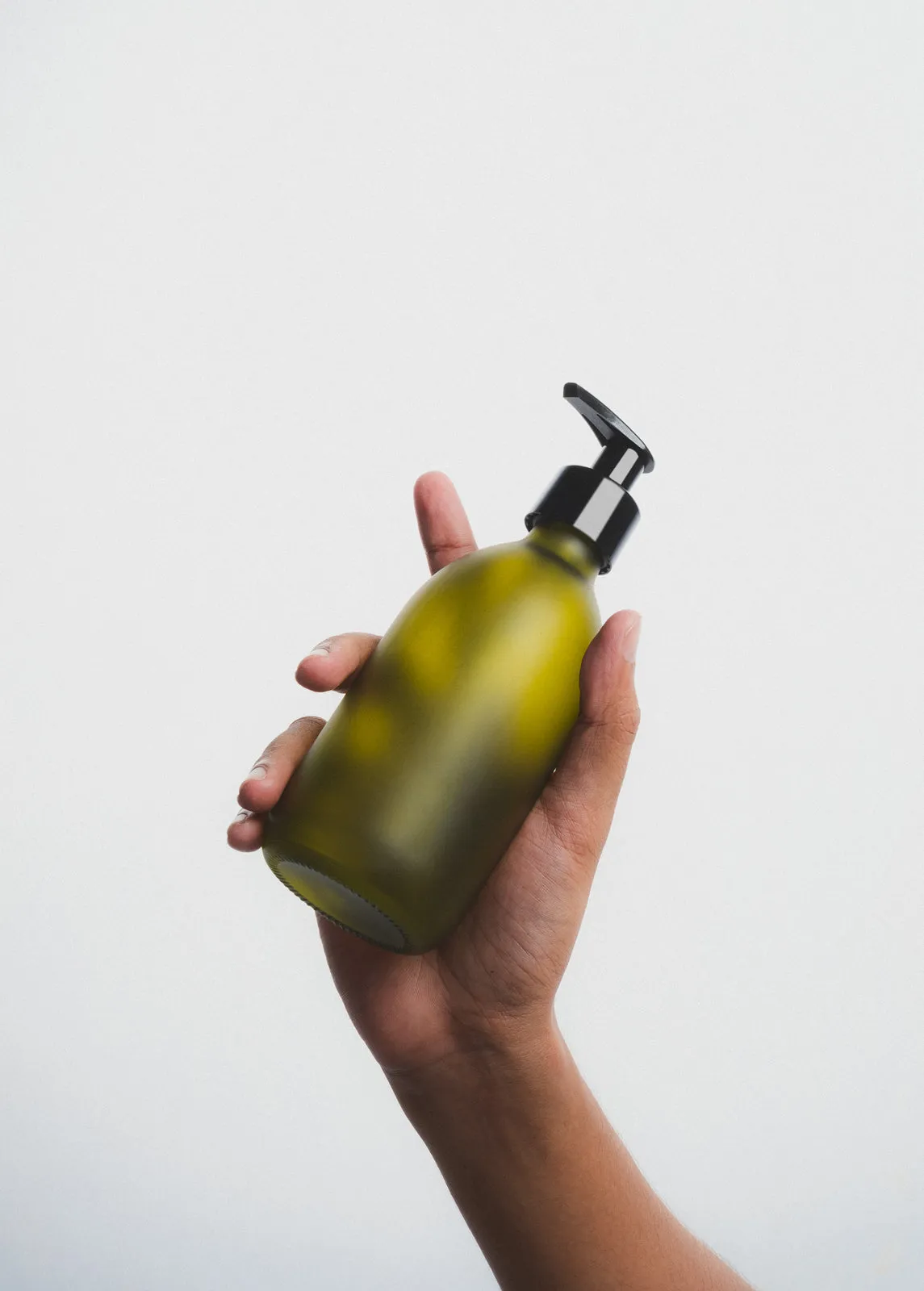 Illustration numéro 5 du produit Flacon pompe en verre vert