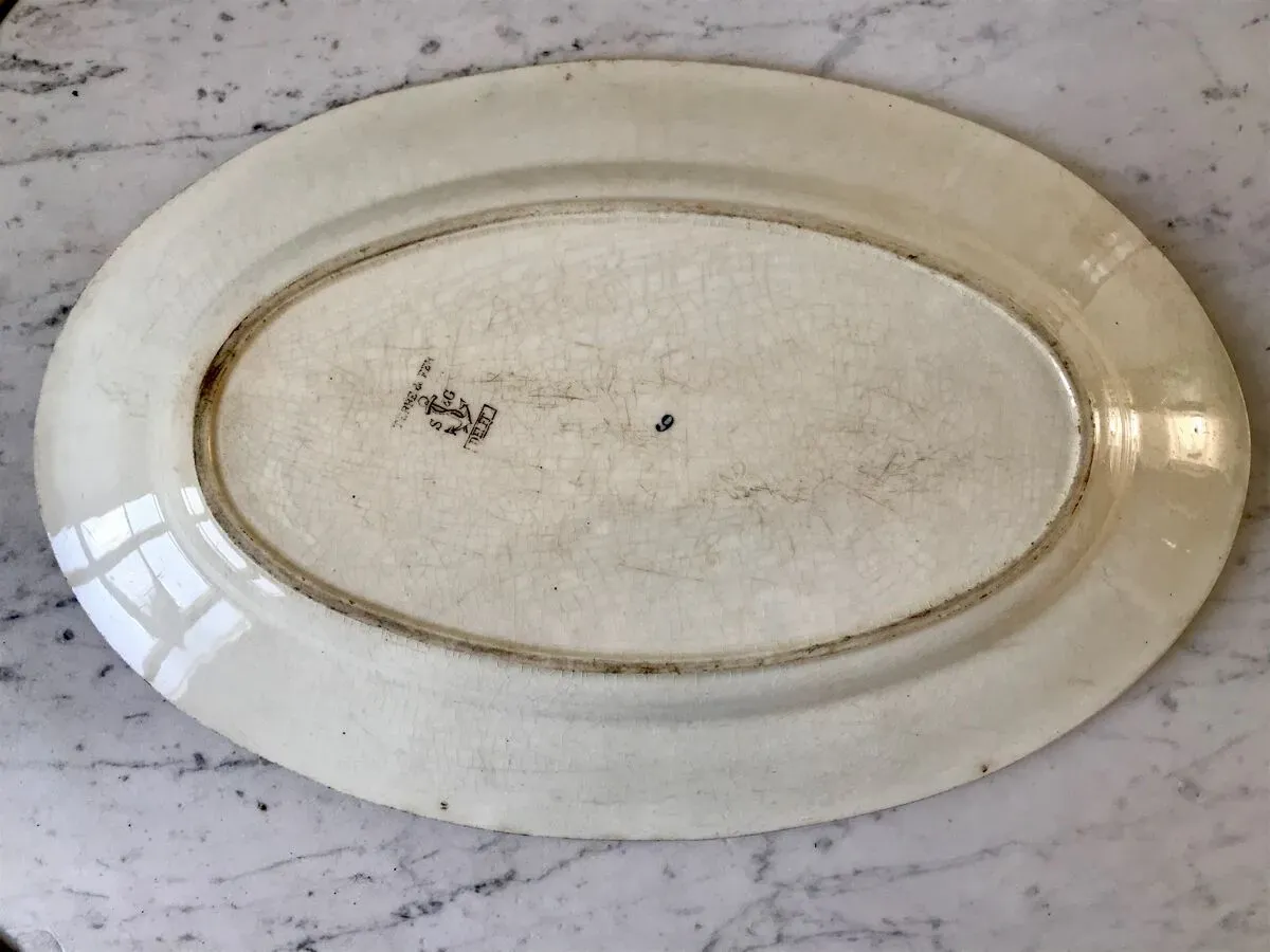 Illustration numéro 5 du produit Plat en Terre de Fer XXème