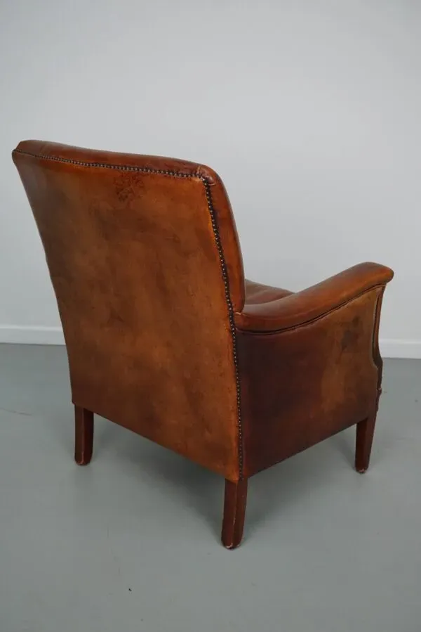 Illustration numéro 5 du produit Fauteuil club en cuir couleur cognac néerlandais vintage