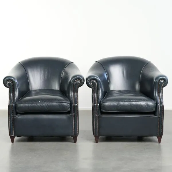 Illustration numéro 5 du produit Ensemble de fauteuils de club en cuir de vache bleu foncé avec un design unique.