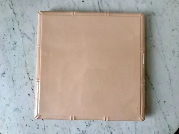 Illustration numéro 5 du produit Dessous de plat en faïence rose effet bambou digoin sarreguemines années 50